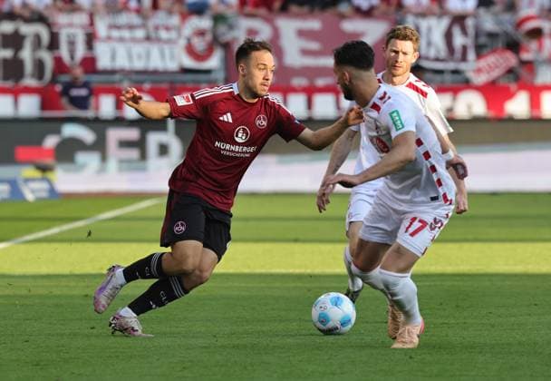 09 05 2025 Soccer Season 2024 2025 2 Soccer Bundesliga 33 Matchday 1 FC Nürnberg FCN Club 1 FC Köln Sportfoto Zink DaMa xdaxmax DFL regulations prohibit any use of photographs as image sequences and or quasi video only for editorial use Julian Justvan 10, 1 FC Nürnberg FCN Florian Kainz 11, FC Köln Leart Paqarada 17, FC Köln
