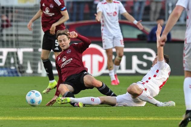 09 05 2025 Soccer Season 2024 2025 2 Soccer Bundesliga 33 Matchday 1 FC Nürnberg FCN Club 1 FC Köln Sportfoto Zink DaMa xdaxmax DFL regulations prohibit any use of photographs as image sequences and or quasi video only for editorial use Caspar Jander 20, 1 FC Nürnberg FCN Eric Martel 6, FC Köln