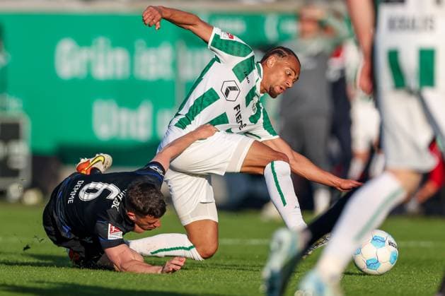 09 05 2025, Fußball, Preußen Münster Hertha BSC, 2 Fußball Bundesliga, 33 Spieltag, Preußenstadion, Saison 2024 2025 Diego Demme Hertha BSC 06 im Zweikampf gegen Etienne Amenyido Preussen Muenster 30 DFB regulations prohibit any use of photographs as image sequences and or quasi video Nordrhein Westfalen Germany
