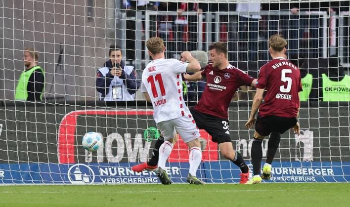 09 05 2025 Soccer Season 2024 2025 2 Soccer Bundesliga 33 Matchday 1 FC Nürnberg FCN Club 1 FC Köln Sportfoto Zink DaMa xdaxmax DFL regulations prohibit any use of photographs as image sequences and or quasi video only for editorial use Tor Treffer Torschuß zum 1 2 Torschütze Florian Kainz 11, FC Köln gg Robin Knoche 31, 1 FC Nürnberg FCN
