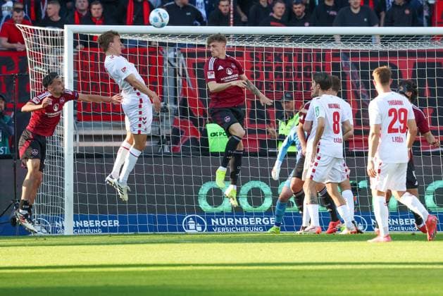 Header by Florian Kainz 11 1 FC Koeln , 1 FC Nuernberg vs 1 FC Koeln Football, 2 Bundesliga, DFL, Saison 2024 2025, Rueckrunde, 33 Spieltag, 09 05 2025 DFB regulations prohibit any use of photographs as image sequences and or quasi video Copyright: xkolbert-press MartinxAgüerax