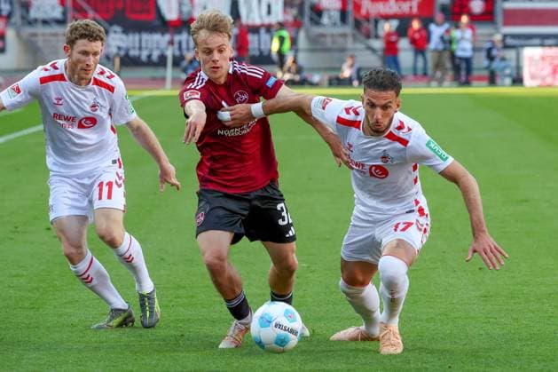 from left to right Florian Kainz 11 1 FC Koeln , Tim Janisch 32 1FC Nuernberg and Leart Paqarada 17 1 FC Koeln , 1 FC Nuernberg vs 1 FC Koeln Football, 2 Bundesliga, DFL, Saison 2024 2025, Rueckrunde, 33 Spieltag, 09 05 2025 DFB regulations prohibit any use of photographs as image sequences and or quasi video Copyright: xkolbert-press MartinxAgüerax