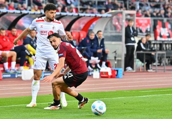09 05 2025 Soccer Season 2024 2025 2 Soccer Bundesliga 33 Matchday 1 FC Nürnberg FCN Club 1 FC Köln Sportfoto Zink xwoxzix DFL regulations prohibit any use of photographs as image sequences and or quasi video only for editorial use Jusuf Gazibegovic 25, FC Köln Berkay Yilmaz 21, 1 FC Nürnberg FCN