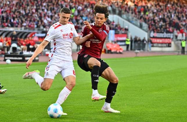09 05 2025 Soccer Season 2024 2025 2 Soccer Bundesliga 33 Matchday 1 FC Nürnberg FCN Club 1 FC Köln Sportfoto Zink xwoxzix DFL regulations prohibit any use of photographs as image sequences and or quasi video only for editorial use Eric Martel 6, FC Köln Janis Antiste 28, 1 FC Nürnberg FCN