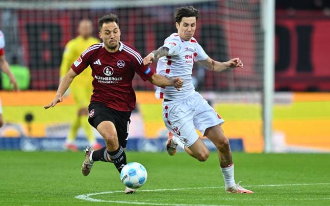 09 05 2025 Soccer Season 2024 2025 2 Soccer Bundesliga 33 Matchday 1 FC Nürnberg FCN Club 1 FC Köln Sportfoto Zink xwoxzix DFL regulations prohibit any use of photographs as image sequences and or quasi video only for editorial use Julian Justvan 10, 1 FC Nürnberg FCN Denis Huseinbasic 8, FC Köln