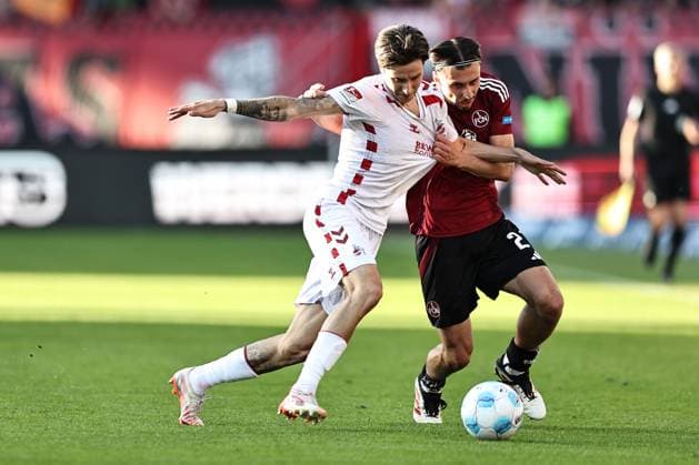 Denis Huseinbasic, FCK, and Berkay Yilmaz, FCN, in the second round match of the 2024 2025 season between 1 FC Nuremberg and 1 FC Cologne 1 2 in Nuremberg 09 05 2025