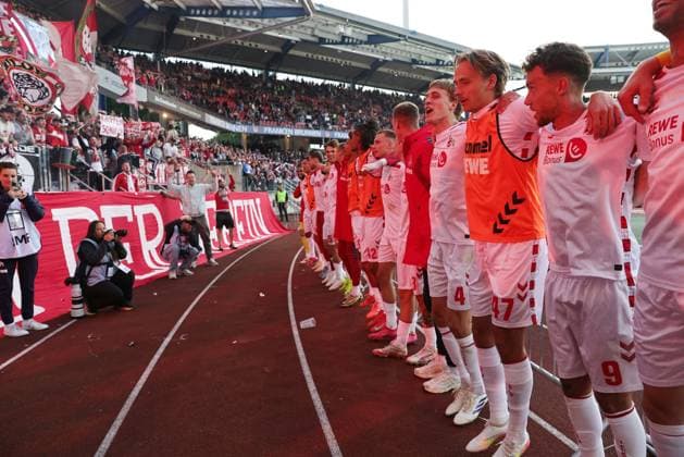 Cologne celebrates with the fans after the second round match of the 2024 2025 season between 1 FC Nuremberg and 1 FC Cologne 1 2 in Nuremberg 09 05 2025