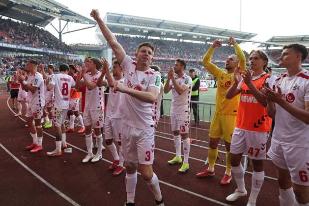 Cologne celebrates with the fans after the second round match of the 2024 2025 season between 1 FC Nuremberg and 1 FC Cologne 1 2 in Nuremberg 09 05 2025