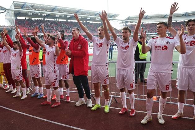 Cologne celebrates with the fans after the second round match of the 2024 2025 season between 1 FC Nuremberg and 1 FC Cologne 1 2 in Nuremberg 09 05 2025