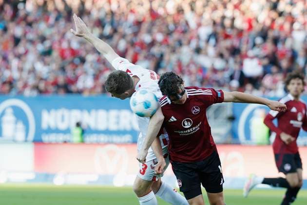 v l Dominique Heintz 1 FC Koeln, 3 and Fabio Gruber 1 FC Nuernberg, 4 , 09 05 2025, Soccer, 2 Bundesliga, 1 FC Nürnberg 1 FC Köln, GER, Nuernberg, Max Morlock Stadion, DFL REGULATIONS PROHIBIT ANY USE OF PHOTOGRAPHS AS IMAGE SEQUENCES AND OR QUASI VIDEO Copyright: HMBxMedia xHeikoxBecker
