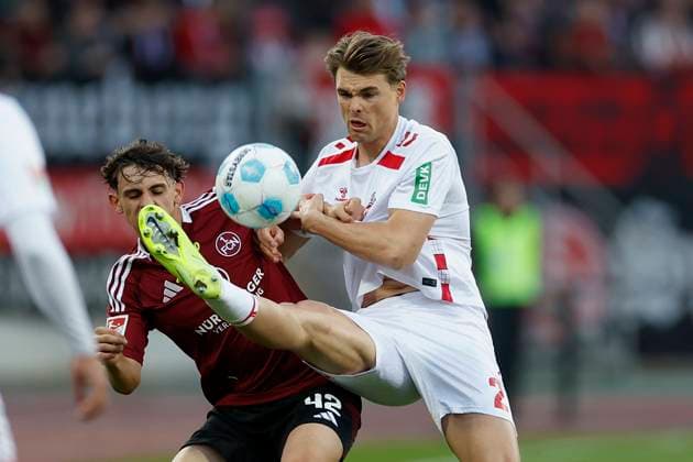 v l Tino Kusanovic 1 FC Nürnberg, 42 and Joel Pascal Schmied 1 FC Koeln, 2 09 05 2025, Football, 2 Bundesliga, 1 FC Nürnberg 1 FC Köln, GER, Nuernberg, Max Morlock Stadion, DFL REGULATES PROHIBIT ANY USE OF PHOTOGRAPHS AS IMAGE SEQUENCES AND OR QUASI VIDEO Copyright: HMBxMedia xHeikoxBecker