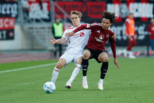 v l Timo Hübers 1 FC Koeln, 4 and Janis Antiste 1 FC Nuernberg, 28 09 05 2025, Football, 2 Bundesliga, 1 FC Nürnberg 1 FC Köln, GER, Nuernberg, Max Morlock Stadion, DFL REGULATIONS PROHIBIT ANY USE OF PHOTOGRAPHS AS IMAGE SEQUENCES AND OR QUASI VIDEO Copyright: HMBxMedia xHeikoxBecker