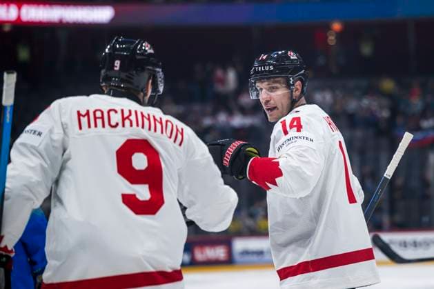 250510 Nathan MacKinnon and Bo Horvat of Canada celebrate after 0 1 during the 2025 IIHF Ice Hockey World Championship group stage game between Slovenia and Canada on May 10, 2025 in Stockholm Photo Maxim Thore BILDBYRAN kod MT MT0810 ishockey ice hockey ishockey vm 2025 vm 2025 iihf world championship slovenia kanada canada bbeng gruppspel jubel  Copyright: MAXIMxTHORE BB250510MT011