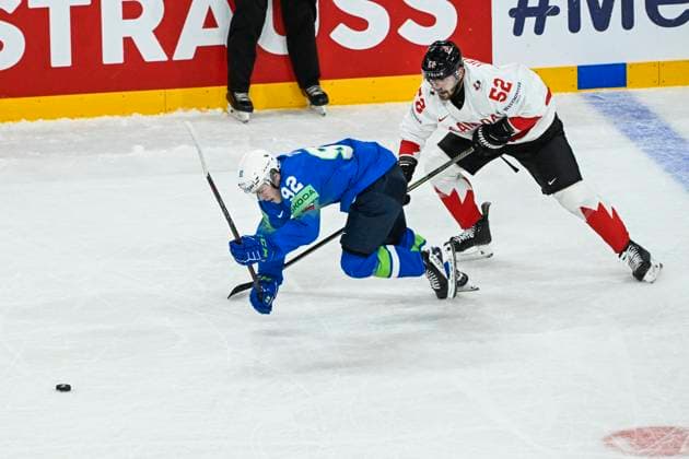 STOCKHOLM, SWEDEN 20250510 Slovenias Anze Zezelj left and Canadas Mackenzie Weegar in action during the IIHF Ice Hockey World Championship group A match between Slovenia and Canada at Avicii Arena in Stockholm, Sweden, on May 10, 2025 STOCKHOLM SWEDEN x10080x  Copyright: xFredrikxSandberg TTx ICE HOCKEY WC SLOVENIA-CANADA