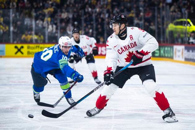 250510 Miha Bericic of Slovenia and Nathan MacKinnon of Canada during the 2025 IIHF Ice Hockey World Championship group stage game between Slovenia and Canada on May 10, 2025 in Stockholm Photo Maxim ThorÃ BILDBYRAN kod MT MT0810 ishockey ice hockey ishockey vm 2025 vm 2025 iihf world championship slovenia kanada canada bbeng group stage  Copyright: MAXIMxTHORE BB250510MT023