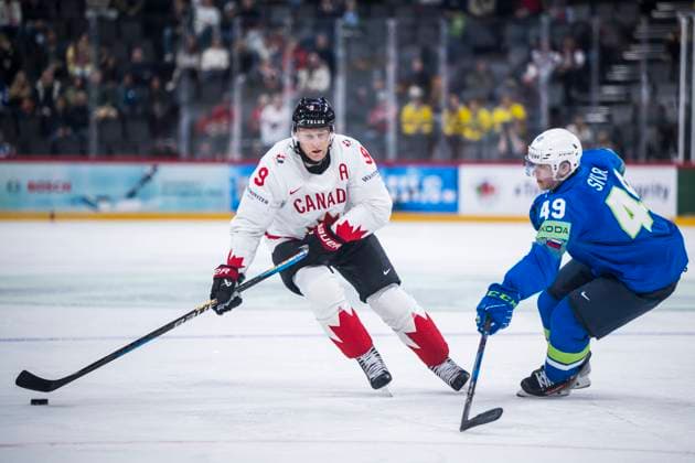 250510 Nathan MacKinnon of Canada and Filip Sitar of Slovenia during the 2025 IIHF Ice Hockey World Championship group stage game between Slovenia and Canada on May 10, 2025 in Stockholm Photo Maxim Thore BILDBYRAN kod MT MT0810 ishockey ice hockey ishockey vm 2025 vm 2025 iihf world championship slovenia kanada canada bbeng gruppspel bbauto  Copyright: MAXIMxTHORE BB250510MT040