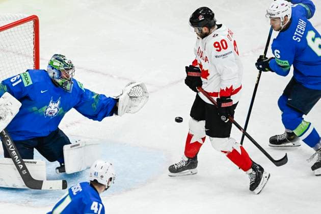 STOCKHOLM, SWEDEN 20250510 Canada s Ryan O Reilly 90, center , Slovenia s goalkeeper Lukas Horak, and Slovenia s Matic Podlipnik 41 and Miha Stebih 6 in action during the IIHF Ice Hockey World Championship group A match between Slovenia and Canada at Avicii Arena in Stockholm, Sweden, on May 10, 2025 STOCKHOLM SWEDEN x10080x  Copyright: xFredrikxSandberg TTx ICE HOCKEY WC SLOVENIA-CANADA