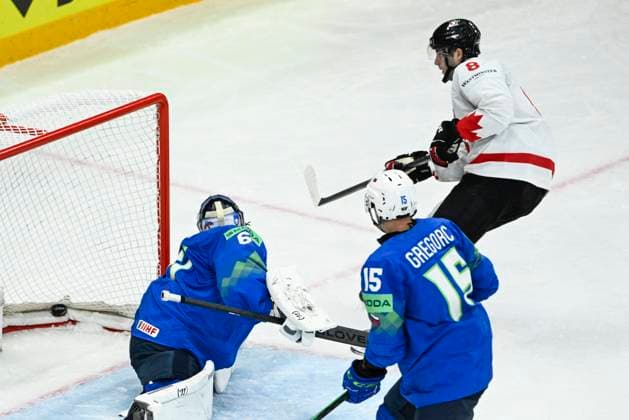 STOCKHOLM, SWEDEN 20250510 Canada s Noah Dobson 8, right scores at Slovenia s goalkeeper Lukas Horak during the IIHF Ice Hockey World Championship group A match between Slovenia and Canada at Avicii Arena in Stockholm, Sweden, on May 10, 2025 STOCKHOLM SWEDEN x10080x  Copyright: xFredrikxSandberg TTx ICE HOCKEY WC SLOVENIA-CANADA