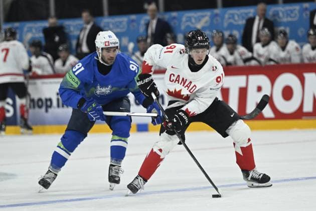 STOCKHOLM, SWEDEN 20250510 Canada s Kent Johnson and Slovenia s Zan Jezovsek during the IIHF Ice Hockey World Championship group A match between Slovenia and Canada at Avicii Arena in Stockholm, Sweden, on May 10, 2025 STOCKHOLM SWEDEN x10080x  Copyright: xFredrikxSandberg TTx ICE HOCKEY WC SLOVENIA-CANADA