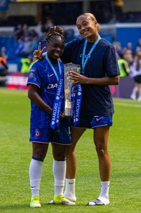 Football - FA Women™s Super League - Chelsea FC Women v Liverpool FC Women LONDON, ENGLAND - Saturday, May 10, 2025: Chelsea s Sandy Baltimore (L) and Maelys MpomÃ celebrate with the WSL trophy as Champions after the FA Women™s Super League match between Chelsea FC Women and Liverpool FC Women at Stamford Bridge. (Photo by David Rawcliffe Propaganda) LONDON Stamford Bridge GREATER LONDON ENGLAND  Copyright: xPropagandax P2025-05-10-Chelsea_W_Liverpool_W-105