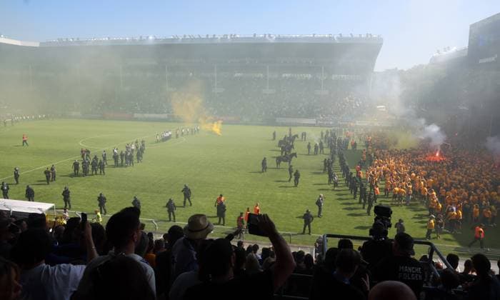 Mannheim, 10 05 2025, Carl Benz Stadion, Soccer, 3 Liga, 37 Matchday , SV Waldhof Mannheim vs SG Dynamo Dresden , Dresden cheers after the match Dynamo is promoted to the 2 Bundesliga , In the picture Dynamo fans celebrate police inside , For editorial use only Only editorial use , DFB DFL regulations prohibit any use of photographs as image sequences and or quasi video , Picture Point