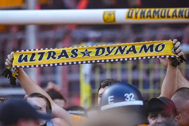 The Ultras of Dynamo Dresden cheer after the end of the game about the promotion and storm onto the pitch after the final whistle, cheering, storming the pitch, fans, audience, spectators, mood, atmosphere, stadium, climber, cheering after the final whistle, joy, cheers, cheer, cheerful, positive, happy, rejoice, optimistic, highlight, action, action, 10 05 2025, Mannheim Germany , Football, 3 Liga, SV Waldhof Mannheim SG Dynamo Dresden, DFB DFL REGULATIONS PROHIBIT ANY USE OF PHOTOGRAPHS AS IMAGE SEQUENCES AND OR QUASI VIDEO xozx