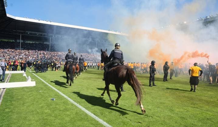 Mannheim, 10 05 2025, Carl Benz Stadion, Soccer, 3 Liga, 37 Matchday , SV Waldhof Mannheim vs SG Dynamo Dresden , Dresden cheers after the match Dynamo is promoted to the 2 Bundesliga , In the picture Dynamo fans celebrate police inside , For editorial use only Only editorial use , DFB DFL regulations prohibit any use of photographs as image sequences and or quasi video , Picture Point