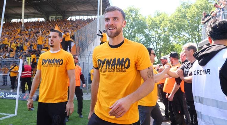 Mannheim, 10 05 2025, Carl Benz Stadion, Soccer, 3 Liga, 37 Matchday , SV Waldhof Mannheim vs SG Dynamo Dresden , Dresden cheers after the match Dynamo is promoted to the 2 Bundesliga , In the picture Dynamo fans celebrate Lars Bünning Buennig 23, Dresden in front , For editorial use only Only editorial use , DFB DFL regulations prohibit any use of photographs as image sequences and or quasi video , Picture Point
