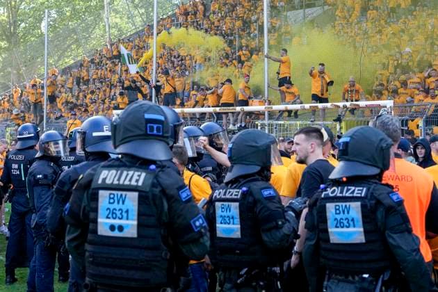 The Ultras of Dynamo Dresden cheer after the end of the game despite the defeat about the promotion, promoted, promoted, cheers after the final whistle, joy, cheers, cheering, cheerful, positive, happy, rejoice, optimistic, highlight, action, fans, audience, spectators, mood, atmosphere, stadium, 10 05 2025, Mannheim Germany , football, 3 Liga, SV Waldhof Mannheim SG Dynamo Dresden, DFB DFL REGULATIONS PROHIBIT ANY USE OF PHOTOGRAPHS AS IMAGE SEQUENCES AND OR QUASI VIDEO xozx