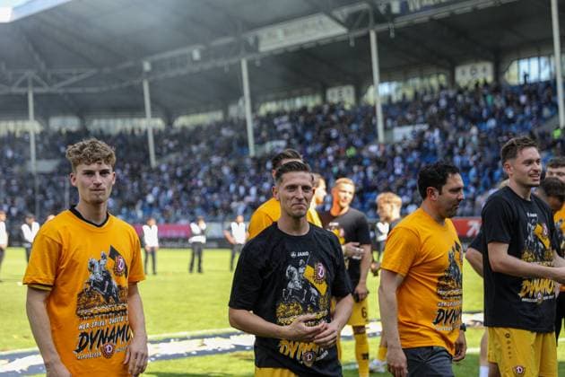 SG Dynamo Dresden players celebrate promotion in front of the visiting fan block at SV Waldhof Mannheim SG Dynamo Dresden on 10 05 25 at Carl Benz Stadium, Mannheim xamx Photo Alfio Marino Copyright:
