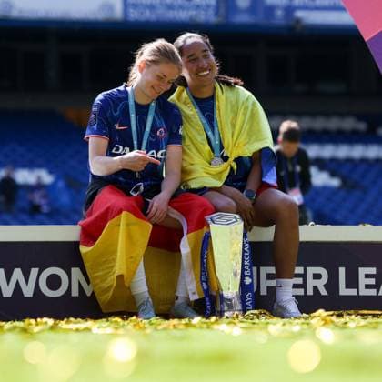 Sjoeke Nusken and Mayra Ramirez of Chelsea pictured sat together with the Barclays Women s Super League trophy Chelsea v Liverpool, Football, Barclays Women s Super League, Stamford Bridge, London, UK - 10 05 25 EDITORIAL USE ONLY No use with unauthorised audio, video, data, fixture lists (outside the EU), club league logos or live services. Online in-match use limited to 45 images (+15 in extra time). No use to emulate moving images. No use in betting, games or  Copyright: xAnthonyxHanc Shutterstockx 15292910fw