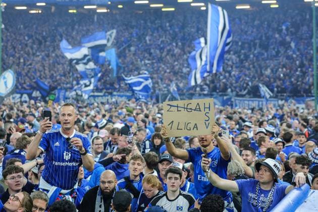 Soccer 2 Bundesliga 33 Matchday Hamburger SV SSV Ulm 1846 Soccer on 10 05 2025 at Volksparkstadion in Hamburg A fan holds a sign with the inscription 2 Liga 1 Liga DFL regulations prohibit any use of photographs as image sequences and or quasi video xJRx