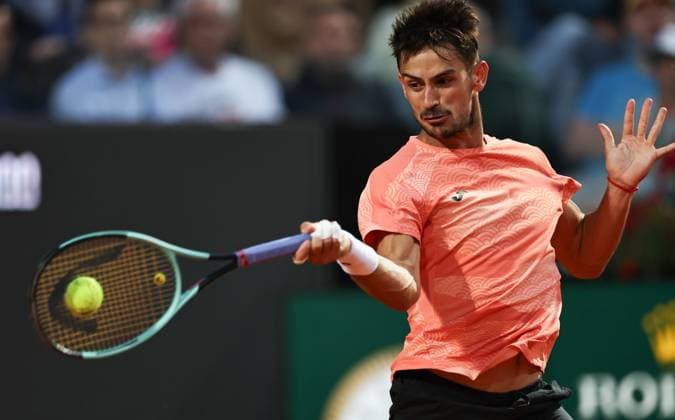 (250511) -- ROME, May 11, 2025 -- Mariano Navone returns a shot during the men s singles round of 64 match between Jannik Sinner of Italy and Mariano Navone of Argentina at the ATP, Tennis Herren Italian Open in Rome, Italy, May 10, 2025. ) (SP)ITALY-ROME-TENNIS-ATP-ITALIAN OPEN-MEN S SINGLES LixJing 