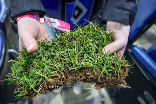 2 Bundesliga Hamburger SV SSV Ulm on 10 05 2025 at Volksparkstadion in Hamburg A fan holds a piece of promotion turf in his hands MH
