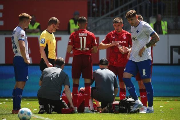11 05 2025, xmohx, Soccer 2 Bundesliga, 1 FC Kaiserslautern SV Darmstadt 98 v l Marlon Ritter 1 FC Kaiserslautern injured, injury, pain, Pain Referee Referee Dr Robin Braun Clemens Riedel SV Darmstadt 98 Kevin Prince Redondo 1 FC Kaiserslautern Daniel Hanslik 1 FC Kaiserslautern Filip Kaloc 1 FC Kaiserslautern Matej Maglica SV Darmstadt 98 DFL DFB REGULATIONS PROHIBIT ANY USE OF PHOTOGRAPHS as IMAGE SEQUENCES and or QUASI VIDEO Kaiserslautern