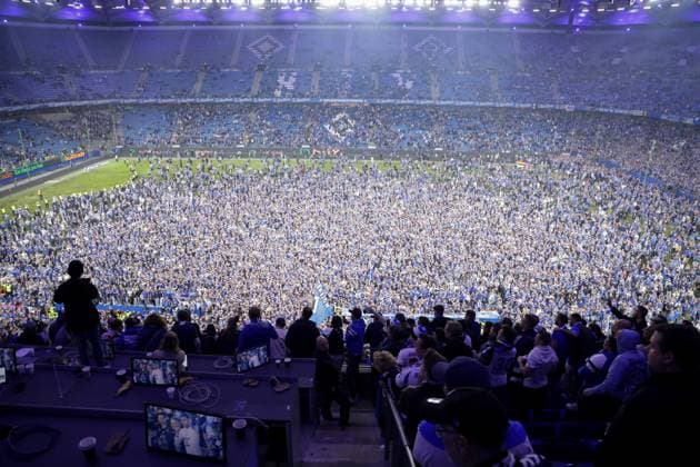 GER, xFSx ,Hamburg, HSV , 2 Bundesliga , Soccer, DFL, Hamburger SV vs SSV Ulm 1846 , in Hamburger Volksparkstadion , 10 05 2025 , v l Hamburger SV fans storm the pitch after the victory against SSV Ulm 1846 and celebrate the promotion to the 1 Bundesliga DFL regulations prohibit any use of photographs as image sequences and or quasi video Copyright: HMBxMedia FernandoxSoares