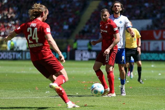 11 05 2025, xrekx, Soccer 2 Bundesliga, 1 FC Kaiserslautern SV Darmstadt 98 v l Jannis Heuer 1 FC Kaiserslautern Luca Sirch 1 FC Kaiserslautern Fraser Hornby SV Darmstadt 98 DFL DFB REGULATIONS PROHIBIT ANY USE OF PHOTOGRAPHS as IMAGE SEQUENCES and or QUASI VIDEO Kaiserslautern