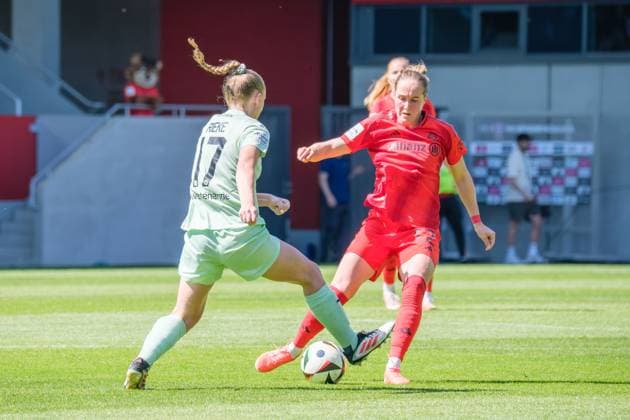 Sydney Lohmann 12, FC Bayern Munich and Annalena Rieke 17, SGS Essen at the match FC Bayern Munich v SGS Essen, Football, Women, Google Pixel Women Bundesliga, 2024 2025, 22 Matchday on 11 05 2025 in Munich, FC Bayern Campus DFL and DFB regulations prohibit any use of photographs as image sequences and or quasi video Bayern Germany