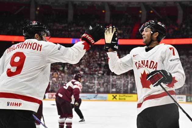 STOCKHOLM, SWEDEN 20250511 Canadas Mike Matheson and Nate MacKinnon celebrating 2 1 during the IIHF Ice Hockey World Championship group A match between Latvia and Canada at Avicii Arena in Stockholm, Sweden, on May 11, 2025 STOCKHOLM SWEDEN x10430x  Copyright: xChristinexOlsson TTx ICE HOCKEY WC LATVIA-CANADA