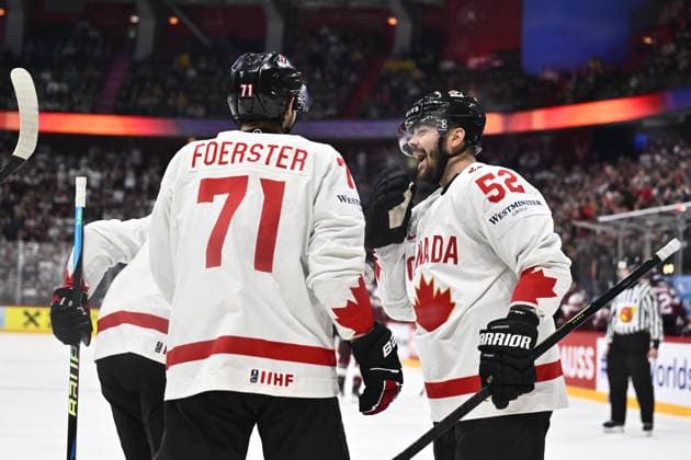 STOCKHOLM, SWEDEN 20250511 Canadas Mackenzie Weegar and Tyson Foerster celebrating 2 1 during the IIHF Ice Hockey World Championship group A match between Latvia and Canada at Avicii Arena in Stockholm, Sweden, on May 11, 2025 STOCKHOLM SWEDEN x10430x  Copyright: xChristinexOlsson TTx ICE HOCKEY WC LATVIA-CANADA