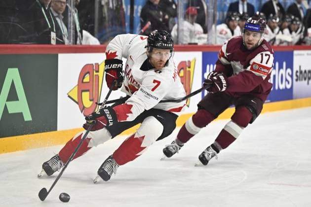 STOCKHOLM, SWEDEN 20250511 Canada s Mike Matheson and Latvia s Martins Dzierkals during the IIHF Ice Hockey World Championship group A match between Latvia and Canada at Avicii Arena in Stockholm, Sweden, on May 11, 2025 STOCKHOLM SWEDEN x10430x  Copyright: xChristinexOlsson TTx ICE HOCKEY WC LATVIA-CANADA