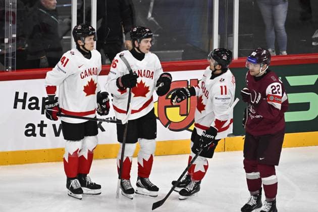 STOCKHOLM, SWEDEN 20250511 Canadas Macklin Celebrini center his goal 1 6 with Ryker Evans and Travis Konecny during the IIHF Ice Hockey World Championship group A match between Latvia and Canada at Avicii Arena in Stockholm, Sweden, on May 11, 2025 STOCKHOLM SWEDEN x10430x  Copyright: xChristinexOlsson TTx ICE HOCKEY WC LATVIA-CANADA
