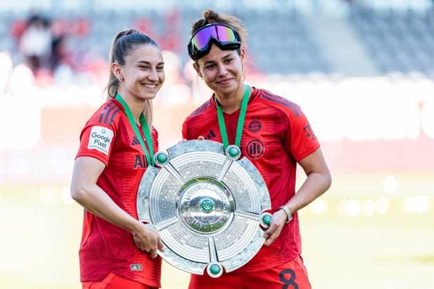 Google Pixel Womens Bundesliga, FC Bayern Munich SGS Essen 11 05 2025 Katharina Naschenweng FC Bayern Munich, 19 and Lena Oberdorf FC Bayern Munich, 8 pose with championship trophy, German champions 2024 25 Google Pixel Womens Bundesliga, FC Bayern Munich SGS Essen, Munich, FC Bayern Campus on 11 05 2025 Copyright: xBEAUTIFULxSPORTS Wunderlx