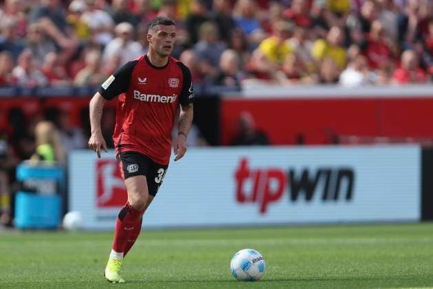 Granit Xhaka Bayer 04 Leverkusen in action, on the ball, single action during the Bundesliga 1 match between Bayer 04 Leverkusen and Borussia Dortmund, BayArena on May 11, 2025 in Leverkusen, Germany Photo by Oliver Kaelke DeFodi Images Granit Xhaka Bayer 04 Leverkusen controls the ball during the Bundesliga match between Bayer 04 Leverkusen and Borussia Dortmund at BayArena on May 11, 2025 in Leverkusen, Germany Photo by Oliver Kaelke DeFodi Images DFL regulations prohibit any use of photographs as image sequences and or quasi video Photo by Oliver Kaelke DeFodi Images