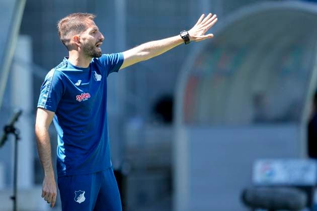 Theodoros Dedes coach, head coach, TSG , gives instructions, gestures, gesticulates with arms, single image, single photo, action, action, 11 05 2025, Sinsheim Hoffenheim Germany , Football, Google Pixel Women Bundesliga, TSG 1899 Hoffenheim FC Carl Zeiss Jena, DFB DFL REGULATIONS PROHIBIT ANY USE OF PHOTOGRAPHS AS IMAGE SEQUENCES AND OR QUASI VIDEO xozx