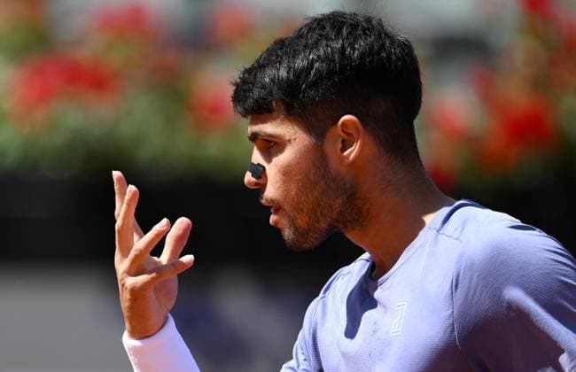 May 13, 2025, Rome: Carlos Alcaraz of Spain reacts during his men s singles round of 16 match against Karen Khachanov of Russia (not pictured) at the Italian Open tennis tournament in Rome, Italy, 13 May 2025. ANSA ETTORE FERRARI Italian Open Tennis Tournament - Day 7  - ZUMAa110 20250513_zaf_a110_002 Copyright: xEttorexFerrarix