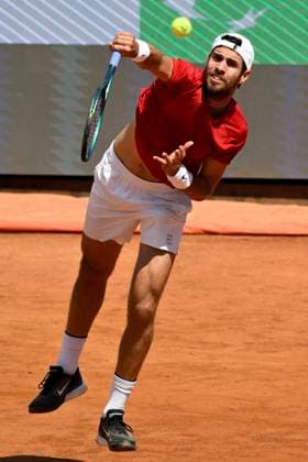 Karen Khachanov of Russia serves during the match against Carlos Alcaraz of Spain at the Internazionali BNL d Italia 2025 tennis tournament at Foro Italico in Rome, Italy on May 13, 2025. AndreaxStaccioli