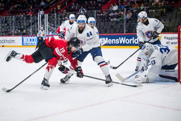 250513 Adam Fantilli of Canada against Kevin Spinozzi and goaltender Julian Junca of France during the 2025 IIHF Ice Hockey World Championship group stage game between Canada and France on May 13, 2025 in Stockholm Photo Maxim Thore BILDBYRAN kod MT MT0814 ishockey ice hockey ishockey vm 2025 vm 2025 iihf world championship kanada canada frankrike france bbeng  Copyright: MAXIMxTHORE BB250513MT011