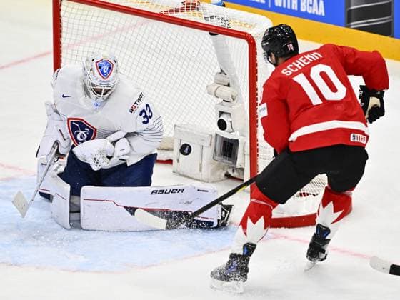 STOCKHOLM, SWEDEN 20250513 France s goalkeeper Julian Junca L saves a puck from Canada s Brayden Schenn during the IIHF Ice Hockey World Championship group A match between Canada and France at Avicii Arena in Stockholm, Sweden, on May 13, 2025 STOCKHOLM SWEDEN x10040x  Copyright: xAndersxWiklund TTx ICE HOCKEY WC CANADA-FRANCE