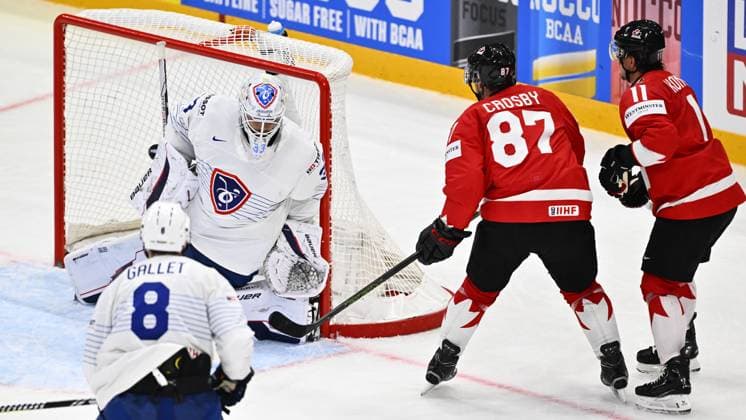 STOCKHOLM, SWEDEN 20250513 France s goalkeeper Julian Junca L saves a puck from Canada s Brayden Schenn during the IIHF Ice Hockey World Championship group A match between Canada and France at Avicii Arena in Stockholm, Sweden, on May 13, 2025 STOCKHOLM SWEDEN x10040x  Copyright: xAndersxWiklund TTx ICE HOCKEY WC CANADA-FRANCE